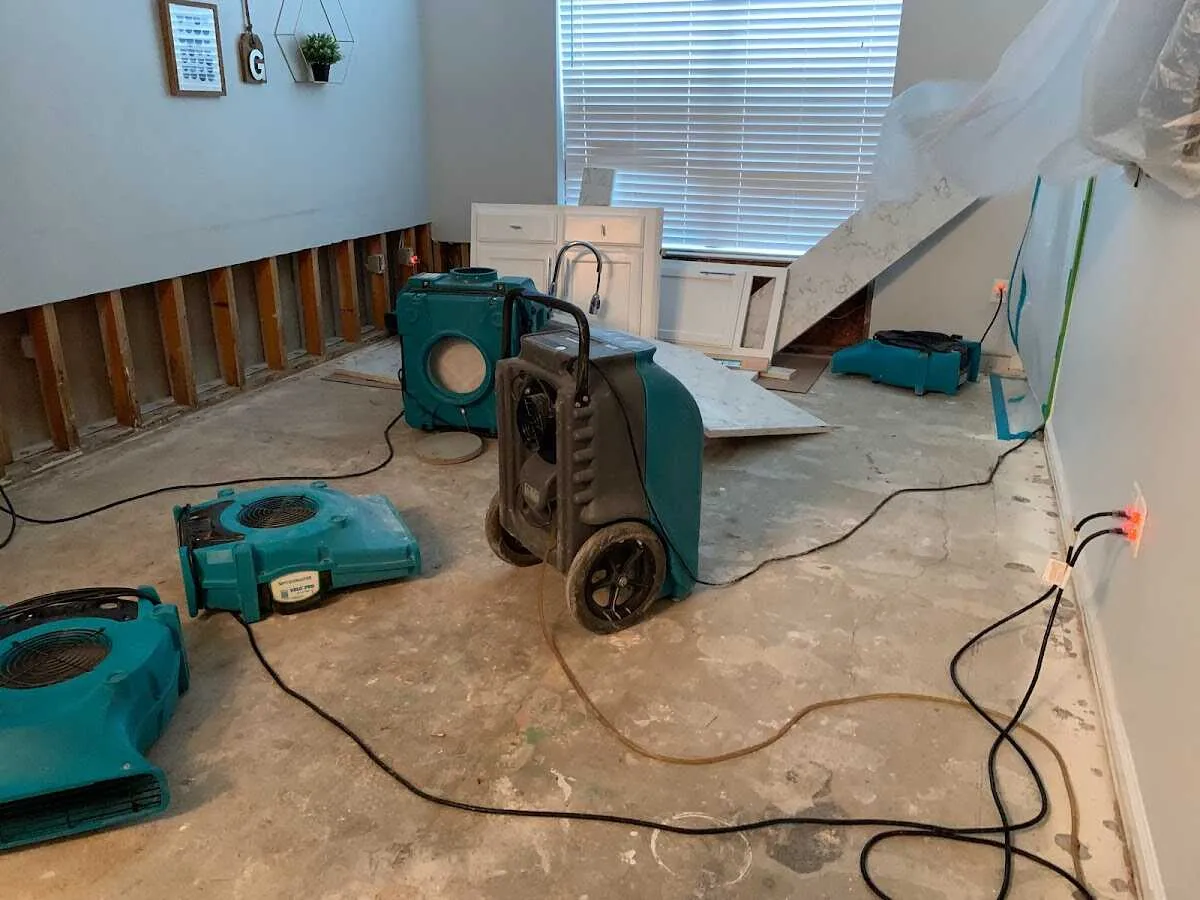 Dehumidifier in flood-cut room for Water Damage Restoration in St. John